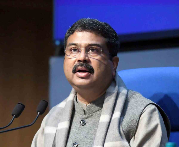 Education Minister Dharmendra Pradhan signing MoUs for innovation and collaboration in academics and industry